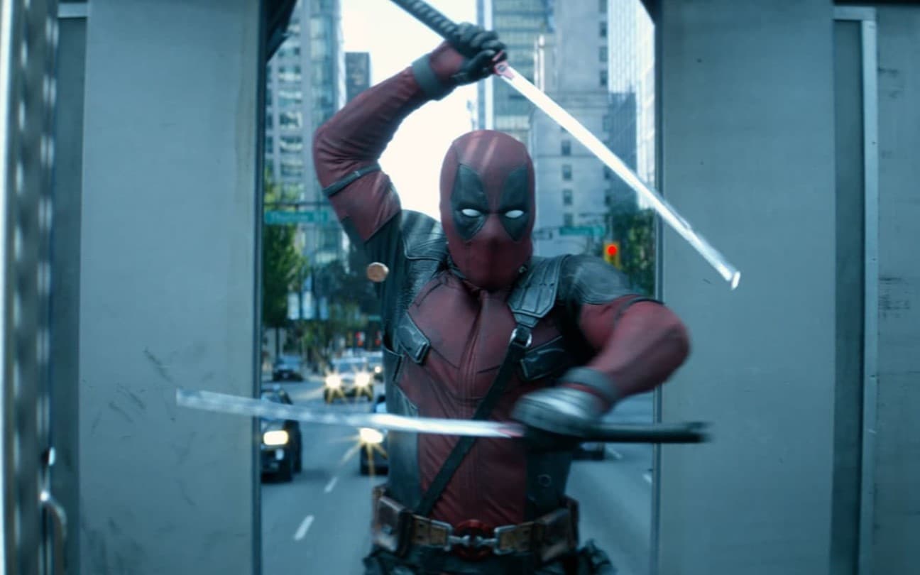 Ryan Reynolds em cena de Deadpool 2