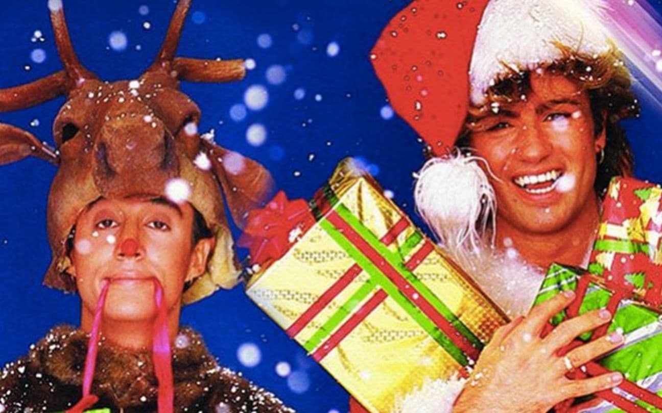 Andrew Ridgeley e George Michael, da banda Wham!, em foto de Natal