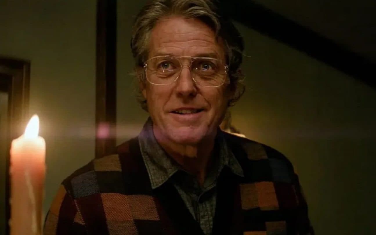 Hugh Grant em cena de Herege
