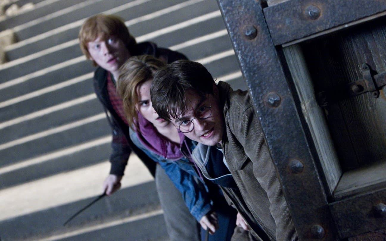 Rupert Grint, Emma Watson e Daniel Radcliffe em Harry Potter e as Relíquias da Morte - Parte 2
