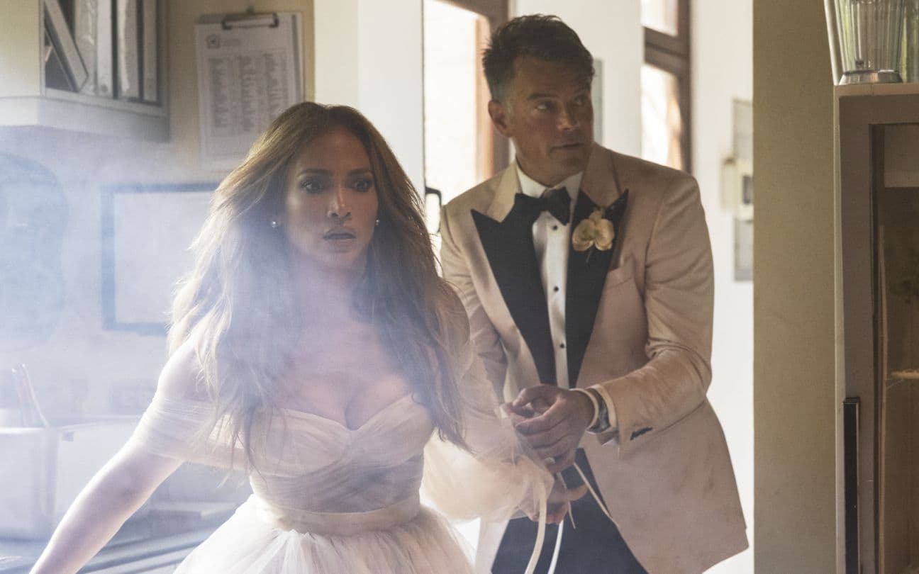Jennifer Lopez e Josh Duhamel em cena de Casamento Armado